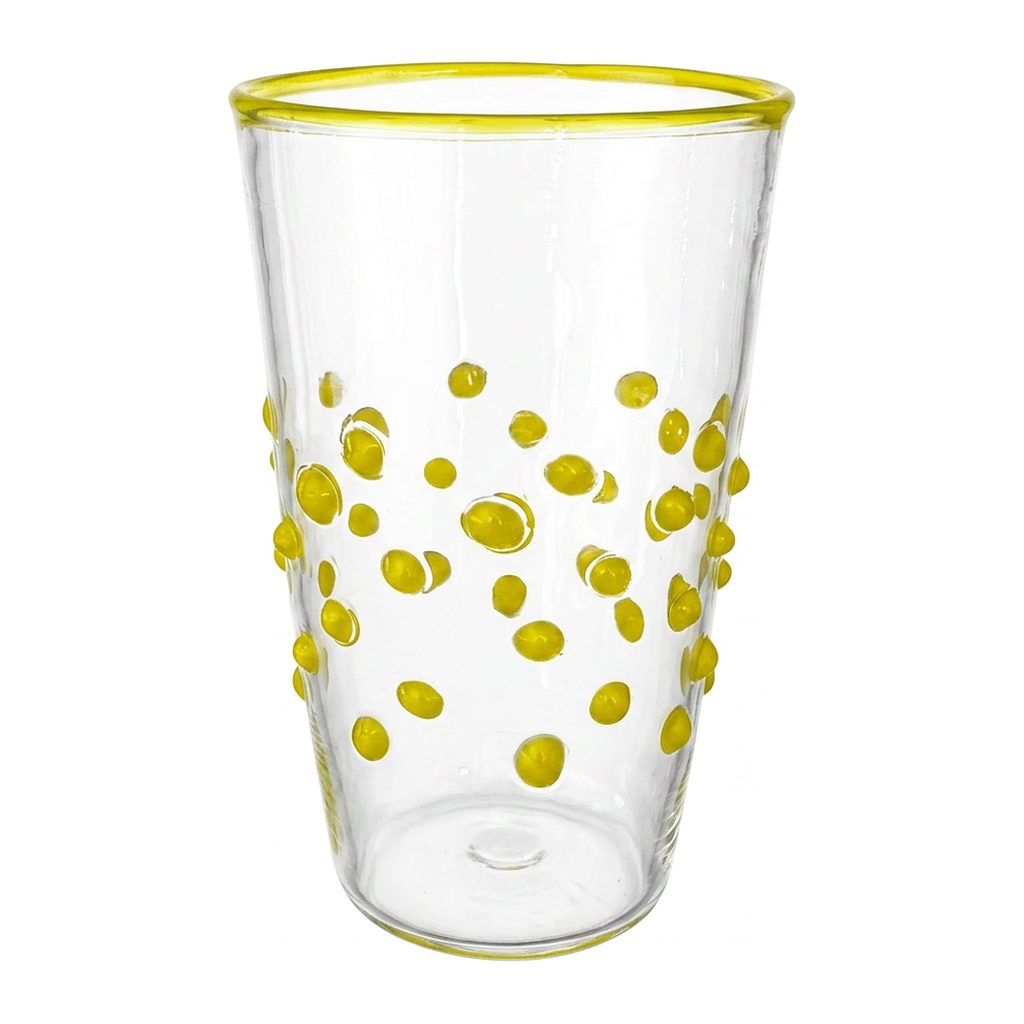 Wasserglas Dots in Farbe Gelb auf weißem Hintergrund