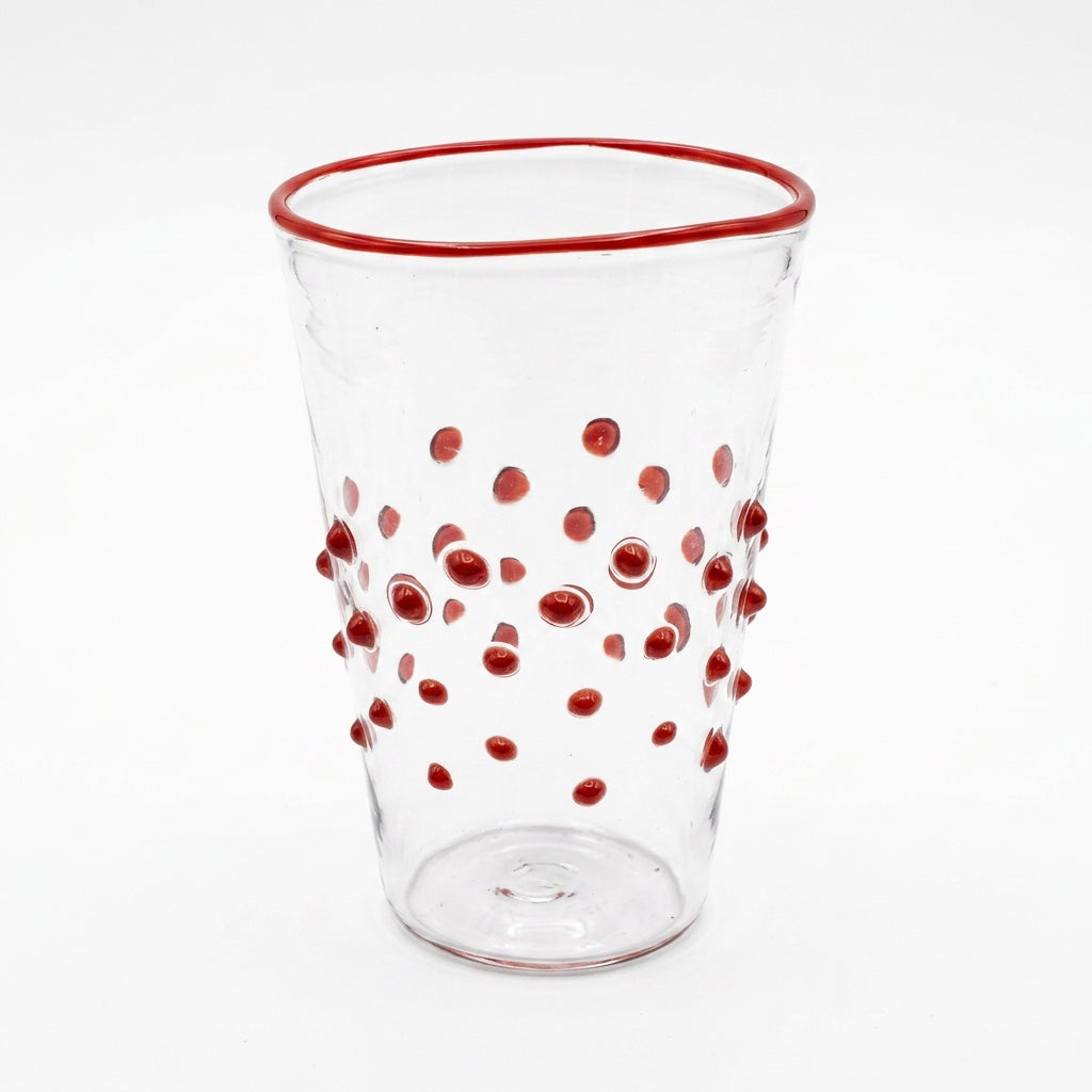 Wasserglas Dots in Farbe Rot auf weißem Hintergrund